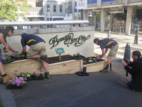 Signs written in moss and colourful flowerbeds adorn the CBD this month as part of a campaign to keep the inner city clean